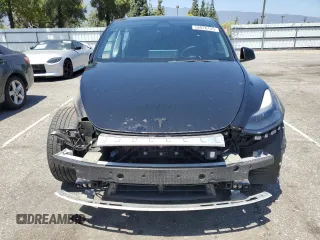 2022 Tesla Model Y Performance z VIN 7SAYGDEF2NF443037, wystawiony jako Copart lot #56870145 z przebiegiem 51 897 mil mil oraz Szkoda całkowita • Salvage title. Historia ofert i sprzedaży dostępna na DreamBid. Obrazek 5.