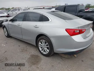2018 Chevrolet Malibu LT z VIN 1G1ZD5ST6JF261270, wystawiony jako IAAI lot #41932928 z przebiegiem 127 971 mil mil oraz . Historia ofert i sprzedaży dostępna na DreamBid. Obrazek 3.