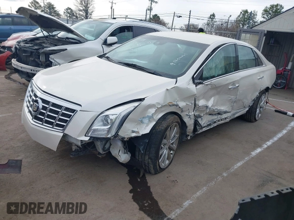 2014 Cadillac XTS Luxury with VIN 2G61M5S3XE9185493, listed as a IAAI auction lot 41711302 with 89,725 mi miles. Bid and sale history available at carsss.com. Image 6.
