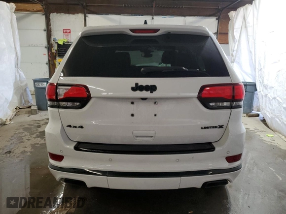 2021 Jeep Grand Cherokee 80th Anniversary z VIN 1C4RJFBG3MC701752, wystawiony jako Copart lot #52396005 z przebiegiem 45 842 mil mil oraz Szkoda całkowita • Salvage title. Historia ofert i sprzedaży dostępna na DreamBid. Obrazek 6.
