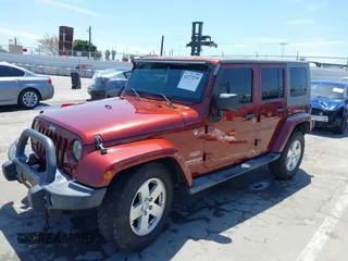 2008 Jeep Wrangler Unlimited Sahara with VIN 1J4GA59108L594193, listed as a IAAI auction lot 42272239 with 161,912 mi miles and . Bid and sale history available at DreamBid. Image 2.