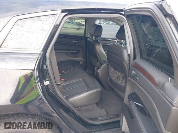 2015 Cadillac SRX Performance Collection with VIN 3GYFNCE3XFS638994, listed as a IAAI auction lot 42243558 with 141,704 mi miles and . Bid and sale history available at DreamBid. Image 8.