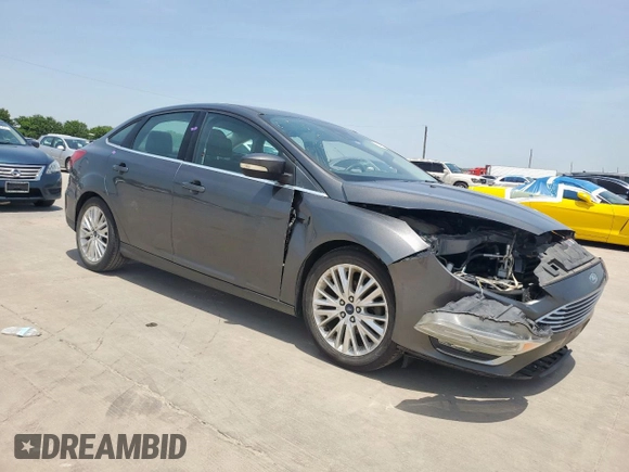 2017 Ford Focus Titanium with VIN 1FADP3J20HL253446, listed as a Copart auction lot 64196895 with 150,633 mi miles and Salvage title. Bid and sale history available at DreamBid. Image 4.