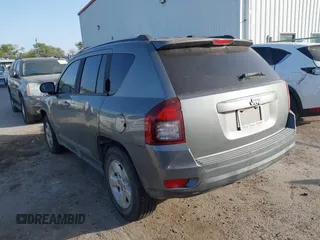 2014 Jeep Compass Sport with VIN 1C4NJCBA6ED620698, listed as a IAAI auction lot 41852056 with 193,085 mi miles and . Bid and sale history available at DreamBid. Image 3.