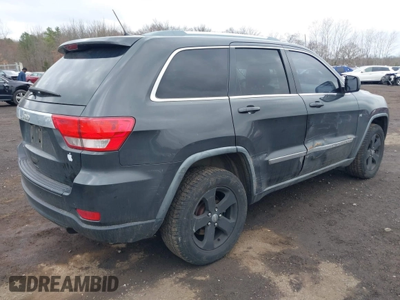 2011 Jeep Grand Cherokee Laredo with VIN 1J4RR4GGXBC597743, listed as a IAAI auction lot 41897286 with 253,111 mi miles and . Bid and sale history available at DreamBid. Image 4.
