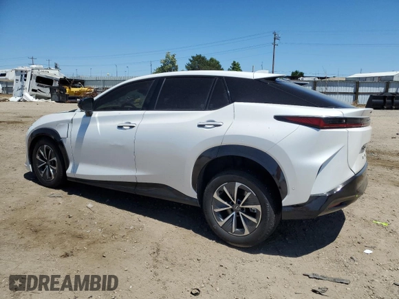 2023 Lexus RZ 450e Premium z VIN JTJAAAAB7PA020268, wystawiony jako Copart lot #58538734 z przebiegiem 12 517 mil mil oraz Szkody całkowita. Historia ofert i sprzedaży dostępna na DreamBid. Obrazek 2.