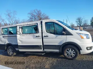 2021 Ford Transit Passenger XL with VIN 1FBAX2Y81MKA14882, listed as a IAAI auction lot 41861105 with 71,457 mi miles. Bid and sale history available at carsss.com. Image 14.