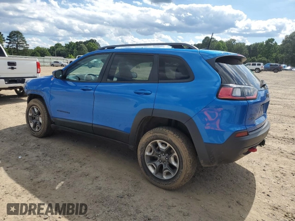 2019 Jeep Cherokee Trailhawk with VIN 1C4PJMBX0KD311114, listed as a Copart auction lot 58799765 with 60,833 mi miles and Salvage title. Bid and sale history available at DreamBid. Image 2.