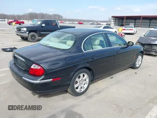 2003 Jaguar S-Type with VIN SAJEA01T93FM64497, listed as a IAAI auction lot 41804705 with 224,978 mi miles and . Bid and sale history available at DreamBid. Image 4.