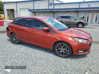2018 Ford Focus SE with VIN 1FADP3FEXJL269131, listed as a Copart auction lot 55894765 with 33,752 mi miles and Salvage title. Bid and sale history available at DreamBid. Image 4.