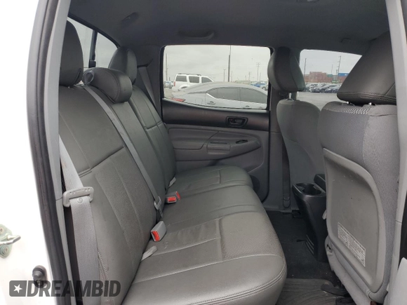 2014 Toyota Tacoma PreRunner with VIN 3TMKU4HN9EM040957, listed as a Copart auction lot 76579404 with 91,222 mi miles and Salvage title. Bid and sale history available at DreamBid. Image 10.