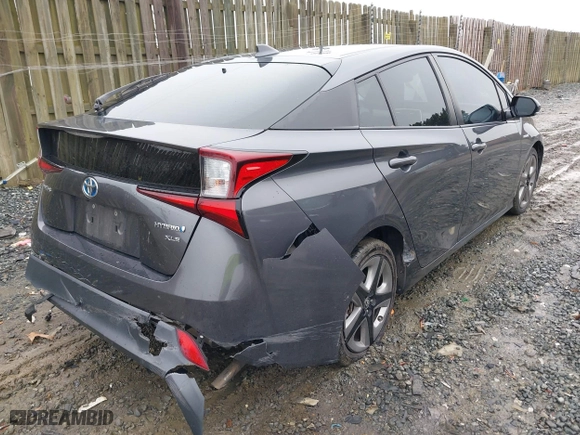2019 Toyota Prius L Eco with VIN JTDKARFU8K3085918, listed as a IAAI auction lot 41107891 with 166,295 mi miles. Bid and sale history available at carsss.com. Image 4.