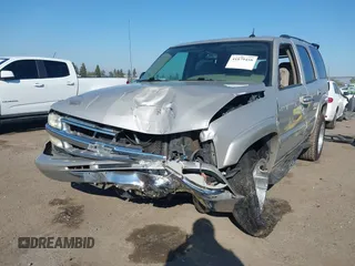 2004 Chevrolet Tahoe LS with VIN 1GNEC13T64J282970, listed as a IAAI auction lot 41879458 with 205,952 mi miles and . Bid and sale history available at DreamBid. Image 17.