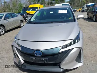 2018 Toyota Prius Plus with VIN JTDKARFP5J3091877, listed as a IAAI auction lot 42129355 with 48,736 mi miles and . Bid and sale history available at DreamBid. Image 12.