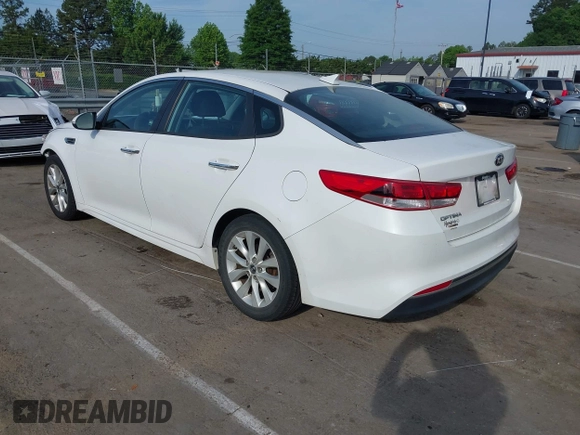 2016 Kia Optima LX with VIN 5XXGT4L34GG061718, listed as a IAAI auction lot 42176256 with 115,572 mi miles and . Bid and sale history available at carsss.com. Image 3.