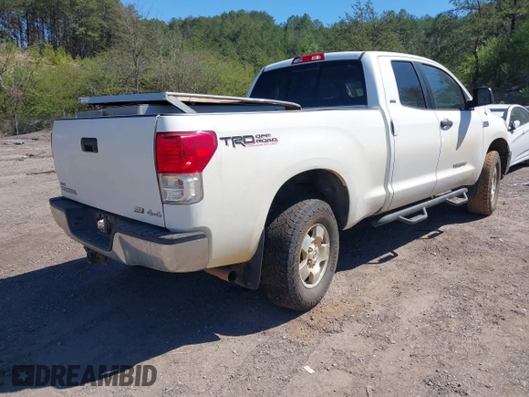 2010 Toyota Tundra z VIN 5TFUW5F15AX148425, wystawiony jako IAAI lot #41829616 z przebiegiem 125 623 mil mil oraz . Historia ofert i sprzedaży dostępna na DreamBid. Obrazek 4.