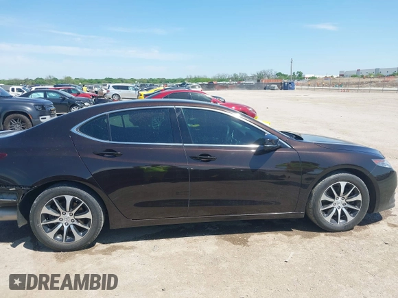 2015 Acura TLX z VIN 19UUB1F31FA018109, wystawiony jako IAAI lot #42045022 z przebiegiem 50 830 mil mil oraz . Historia ofert i sprzedaży dostępna na DreamBid. Obrazek 14.