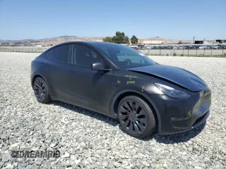 2022 Tesla Model Y Performance with VIN 7SAYGDEF8NF492954, listed as a Copart auction lot 61419965 with 24,885 mi miles and Salvage title. Bid and sale history available at DreamBid. Image 4.