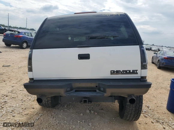 1996 Chevrolet Tahoe with VIN 3GNEK18R9TG165142, listed as a Copart auction lot 70018514 with 141,403 mi miles and Salvage Title. Bid and sale history available at carsss.com. Image 6.