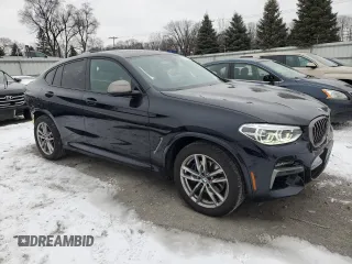 2021 BMW X4 M40i z VIN 5UX2V5C06M9F70459, wystawiony jako Copart lot #87397614 z przebiegiem 35 233 mil mil oraz Szkoda całkowita • Salvage title. Historia ofert i sprzedaży dostępna na DreamBid. Obrazek 4.