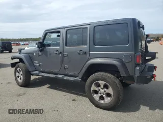 2018 Jeep Wrangler Unlimited Sahara with VIN 1C4BJWEG7JL856331, listed as a Copart auction lot 50246135 with 101,014 mi miles and Salvage title. Bid and sale history available at DreamBid. Image 2.