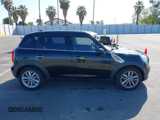 2013 MINI Countryman z VIN WMWZB3C52DWM07621, wystawiony jako IAAI lot #42085389 z przebiegiem 153 714 mil mil oraz . Historia ofert i sprzedaży dostępna na DreamBid. Obrazek 13.
