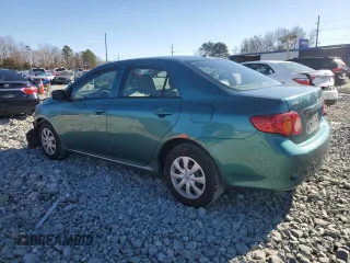 2010 Toyota Corolla with VIN 1NXBU4EE3AZ281936, listed as a Copart auction lot 88146295 with 56,007 mi miles and Salvage Title. Bid and sale history available at DreamBid. Image 2.