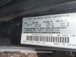 2014 Mazda 3 S Grand Touring with VIN JM1BM1W35E1212740, listed as a IAAI auction lot 41632056 with 158,872 mi miles and . Bid and sale history available at DreamBid. Image 9.