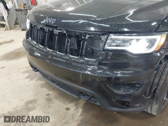 2021 Jeep Grand Cherokee Laredo X with VIN 1C4RJFAG5MC817567, listed as a IAAI auction lot 42297526 with 71,387 mi miles and . Bid and sale history available at DreamBid. Image 6.