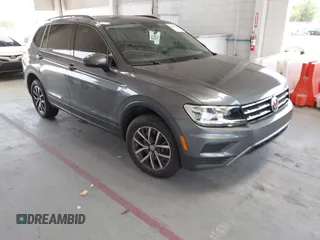 2021 Volkswagen Tiguan S z VIN 3VV1B7AX0MM030915, wystawiony jako IAAI lot #42198262 z przebiegiem 47 500 mil mil oraz . Historia ofert i sprzedaży dostępna na DreamBid. Obrazek 1.