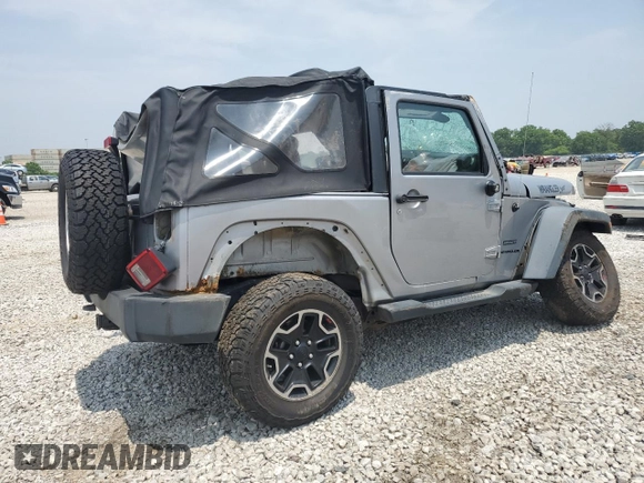2013 Jeep Wrangler Sport with VIN 1C4AJWAG0DL696928, listed as a Copart auction lot 60822915 with 169,503 mi miles and Salvage title. Bid and sale history available at DreamBid. Image 3.