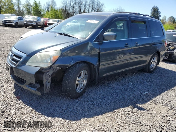 2005 Honda Odyssey EX with VIN 5FNRL38415B009502, listed as a Copart auction lot 53872455 with 205,051 mi miles and Salvage title. Bid and sale history available at DreamBid. Image 1.