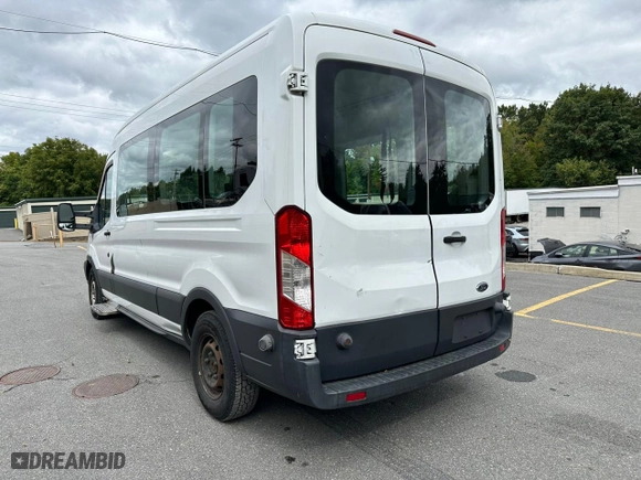 2015 Ford Transit Wagon XL with VIN 1FDZX2CM5FKA43044, listed as a Copart auction lot 73170894 with 215,199 mi miles and Clean Title. Bid and sale history available at carsss.com. Image 2.