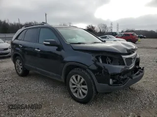 2011 Kia Sorento LX with VIN 5XYKT4A22BG054386, listed as a Copart auction lot 85005104 with 182,281 mi miles and Salvage Title. Bid and sale history available at carsss.com. Image 4.