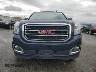 2017 GMC Yukon SLT with VIN 1GKS1BKC5HR295827, listed as a Copart auction lot 48189565 with 106,867 mi miles and Salvage Title. Bid and sale history available at carsss.com. Image 5.
