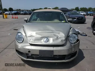2015 Volkswagen Beetle 1.8T с VIN 3VW517AT5FM804169, выставлен на аукционе Copart как лот 65981544 с пробегом 104 754 миль миль и Списание • Salvage title. История ставок и продаж доступна на DreamBid. Изображение 5.