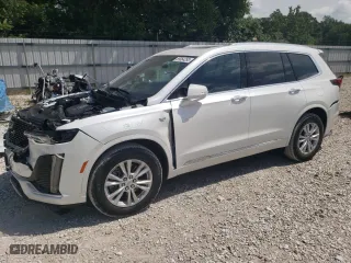 2022 Cadillac XT6 Luxury with VIN 1GYKPAR41NZ163141, listed as a Copart auction lot 59064293 with 10,128 mi miles. Bid and sale history available at carsss.com. Image 1.