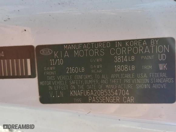 2011 Kia Forte Koup EX with VIN KNAFU6A20B5354704, listed as a Copart auction lot 83010764 with 211196 miles and Salvage Title. Bid and sale history available at carsss.com. Image 12.
