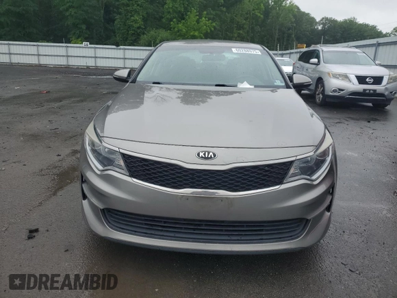 2017 Kia Optima LX z VIN 5XXGT4L39HG145177, wystawiony jako Copart lot #60288975 z przebiegiem 89 237 mil mil oraz Szkoda całkowita • Salvage title. Historia ofert i sprzedaży dostępna na DreamBid. Obrazek 5.