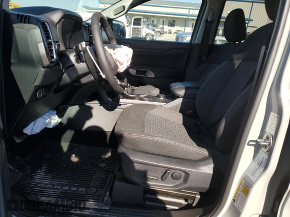 2024 Ford Ranger XLT with VIN 1FTER4HHXRLE20468, listed as a Copart auction lot 79519994 with 9,386 mi miles and Salvage title. Bid and sale history available at DreamBid. Image 7.