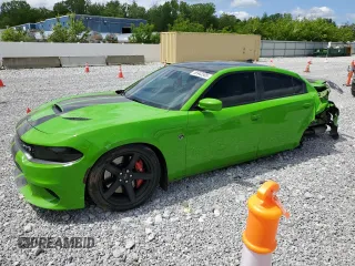 2017 Dodge Charger SRT Hellcat z VIN 2C3CDXL97HH592870, wystawiony jako Copart lot #56943505 z przebiegiem 84 853 mil mil oraz Szkoda całkowita • Salvage title. Historia ofert i sprzedaży dostępna na DreamBid. Obrazek 1.