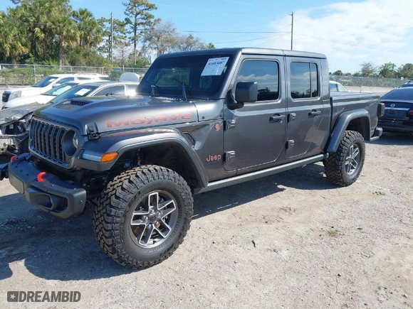 2024 Jeep Gladiator Mojave X with VIN 1C6JJTEGXRL123199, listed as a IAAI auction lot 41683087 with 7,326 mi miles. Bid and sale history available at carsss.com. Image 2.
