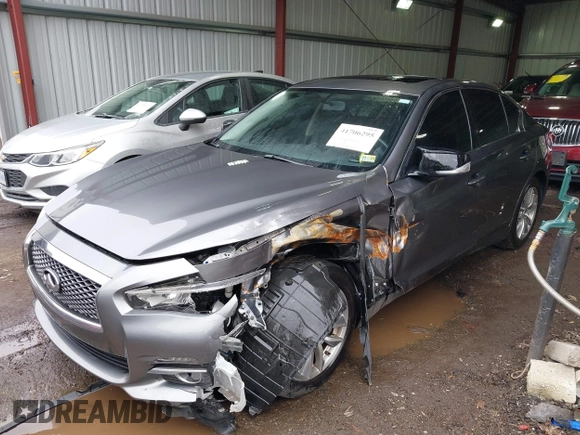 2015 Infiniti Q50 Premium z VIN JN1BV7ARXFM411040, wystawiony jako IAAI lot #41706295 z przebiegiem 97 297 mil mil oraz . Historia ofert i sprzedaży dostępna na DreamBid. Obrazek 6.