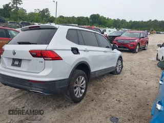 2018 Volkswagen Tiguan S with VIN 3VV1B7AX0JM041120, listed as a IAAI auction lot 42219662 with 160,852 mi miles and . Bid and sale history available at DreamBid. Image 4.