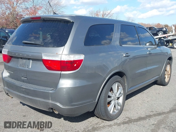 2011 Dodge Durango Heat with VIN 1D4RE3GG8BC733088, listed as a IAAI auction lot 40764161 with 149,846 mi miles. Bid and sale history available at carsss.com. Image 4.