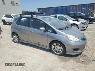 2009 Honda Fit Sport with VIN JHMGE88449S012139, listed as a Copart auction lot 60046185 with 255,292 mi miles and Clean title. Bid and sale history available at DreamBid. Image 4.