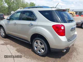 2014 Chevrolet Equinox LTZ z VIN 2GNFLDE33E6129917, wystawiony jako IAAI lot #42209167 z przebiegiem 190 445 mil mil oraz . Historia ofert i sprzedaży dostępna na DreamBid. Obrazek 3.