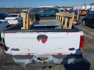 2000 Ford F-150 z VIN 2FTPX17L7YCA51774, wystawiony jako IAAI lot #41426958 z przebiegiem 421 412 mil mil oraz . Historia ofert i sprzedaży dostępna na DreamBid. Obrazek 16.