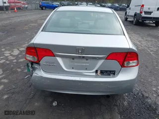 2009 Honda Civic Sdn LX with VIN 2HGFA16559H313538, listed as a IAAI auction lot 42052791 with 136,594 mi miles. Bid and sale history available at carsss.com. Image 13.