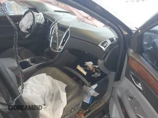2011 Cadillac SRX Luxury Collection z VIN 3GYFNAEY4BS655011, wystawiony jako IAAI lot #41990104 z przebiegiem 133 246 mil mil oraz . Historia ofert i sprzedaży dostępna na DreamBid. Obrazek 5.